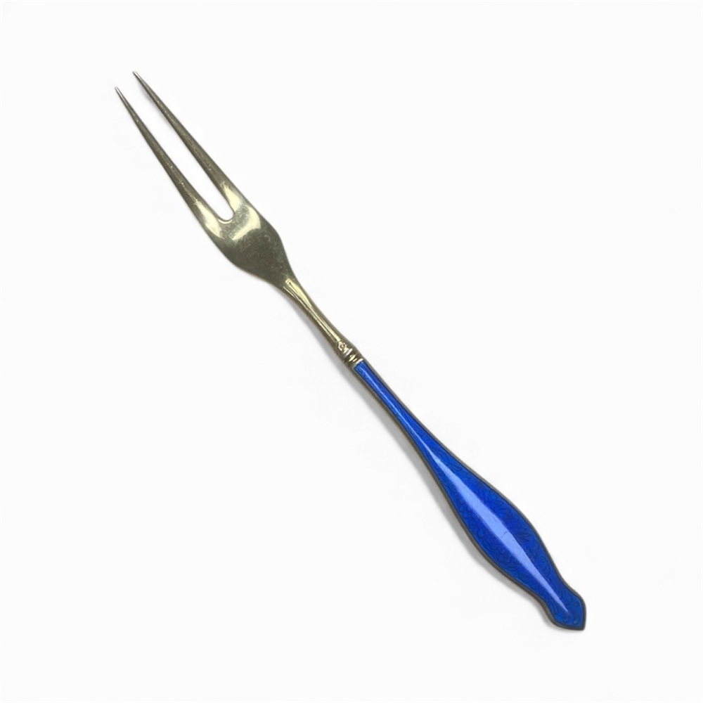 Gold washed Sterling and enamel pickle fork for luxury dining